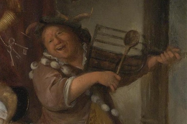 The fiddler plays on, his face joyful.