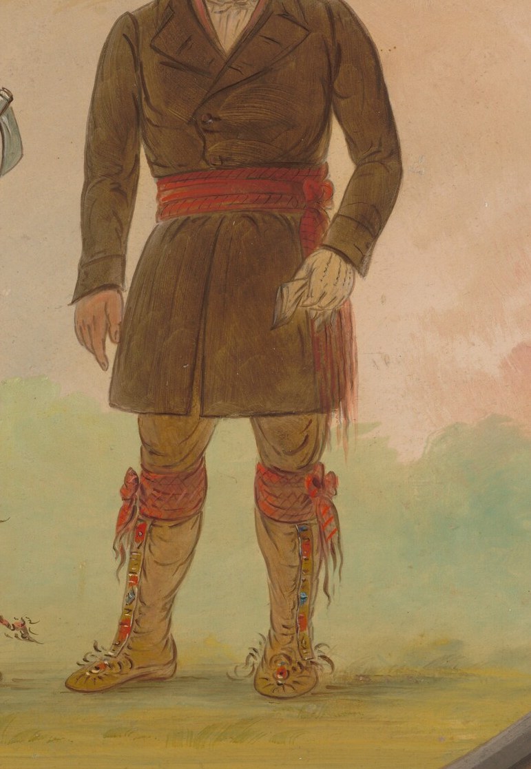 The missionary's dark coat contrasts with their traditional attire.