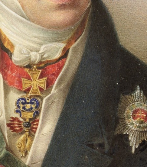 The silver star and red-and-gold cross are diplomatic code.