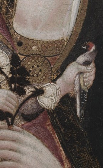 Now, look closely at the Christ Child's golden garment.