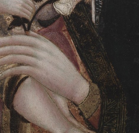 Mary cradles Jesus, flanked by two important saints.