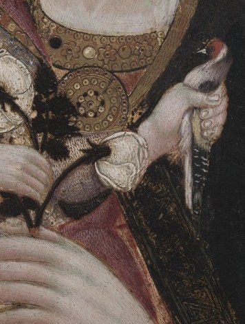 Saint Jerome, with his cardinal's robes, is on the left.