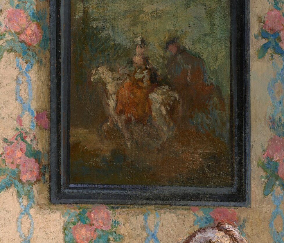 A framed hunting scene hangs on the wall.