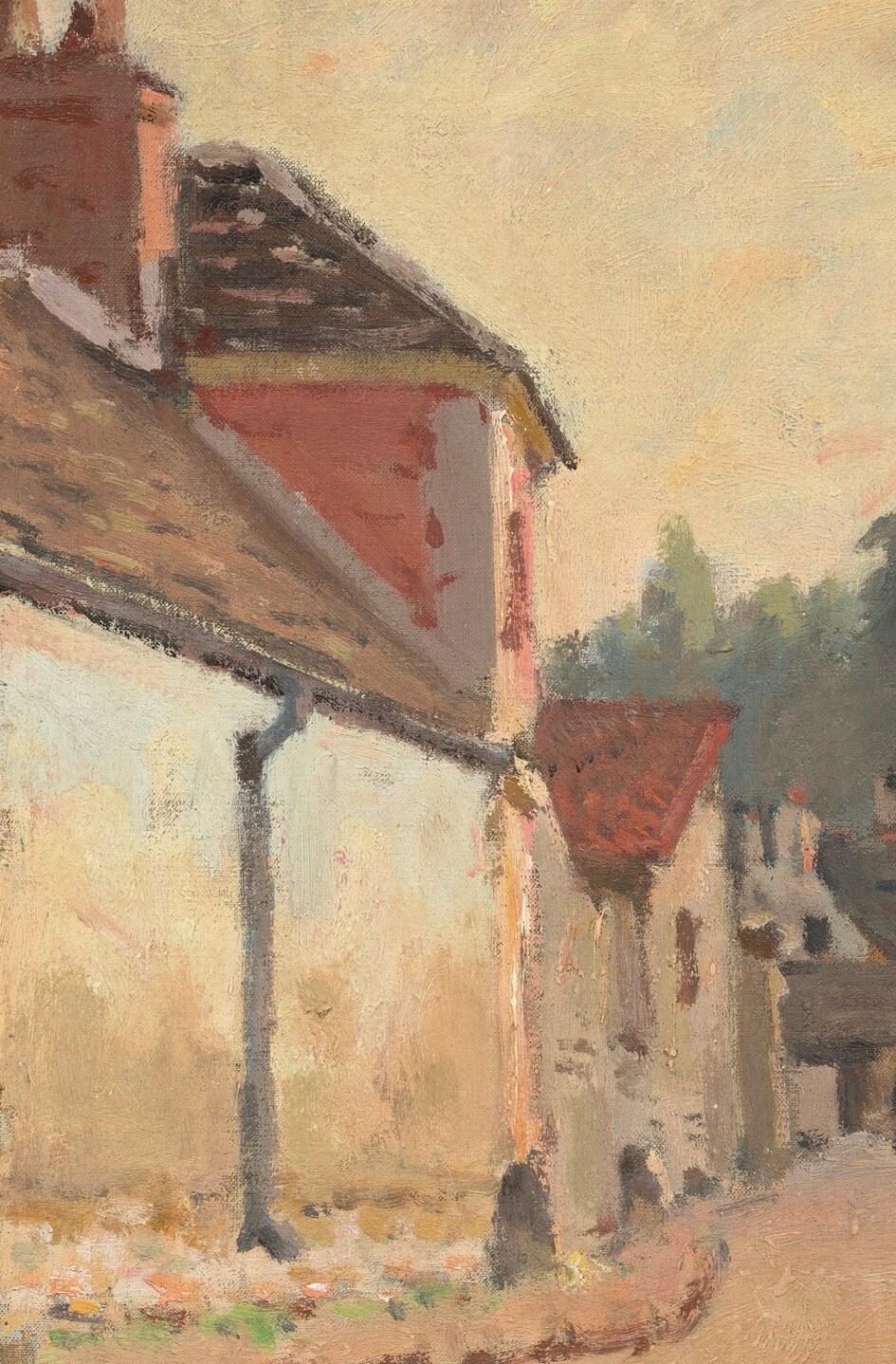 Look closely at the small building on the left side of the road.