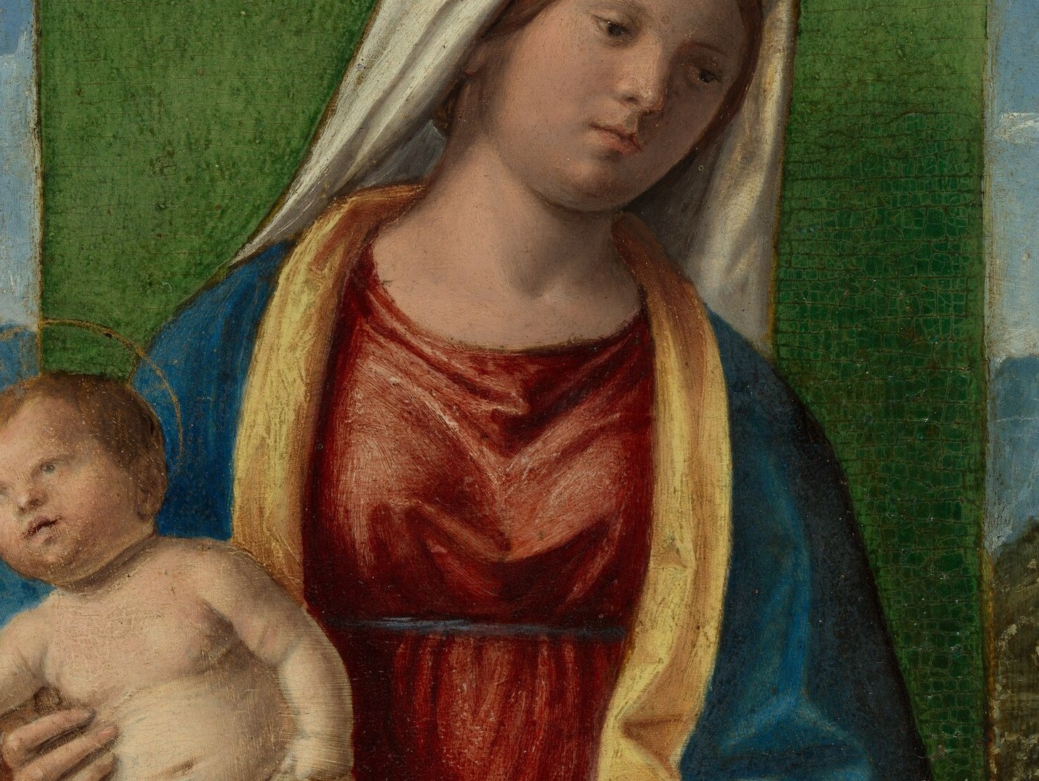 The naked infant twists slightly outward toward the viewer, a classic Cima device that draws the eye and humanizes the divine.