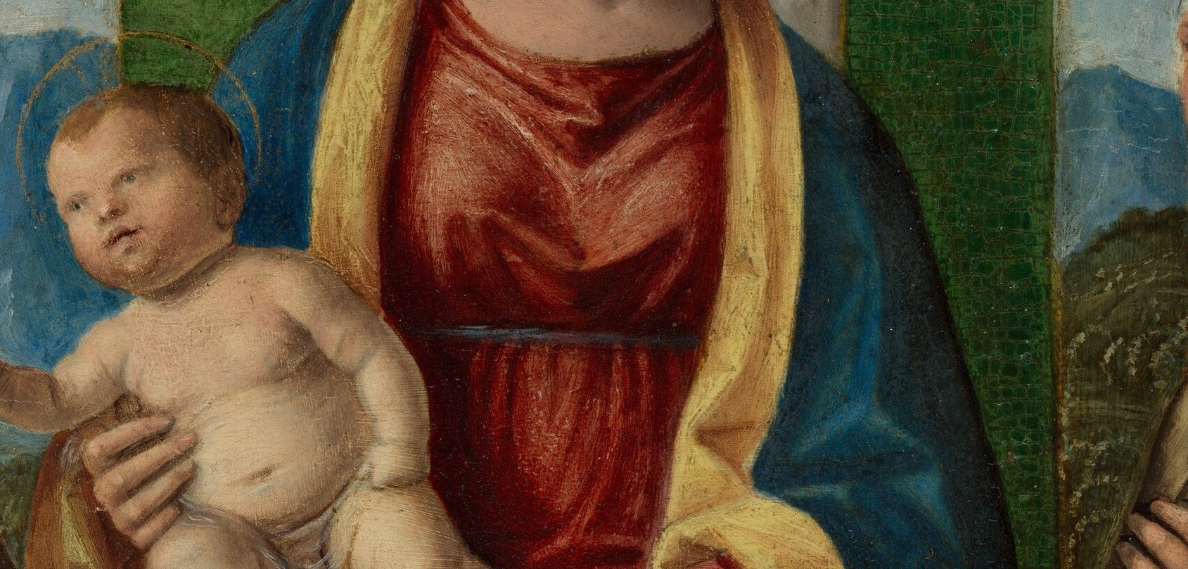 Elegant, elongated fingers supporting the child show Cima's precise oil rendering of flesh and drapery meeting.