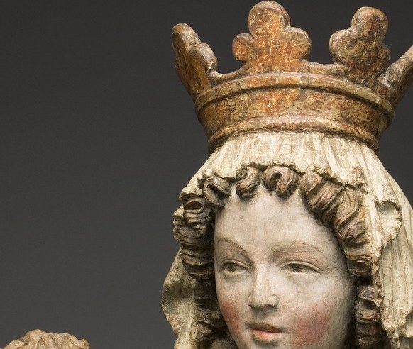 Expressionless, smooth, deeply idealized Gothic 'Beautiful Madonna' type , the controlled blankness is itself a theological statement about transcendence, not inattention.