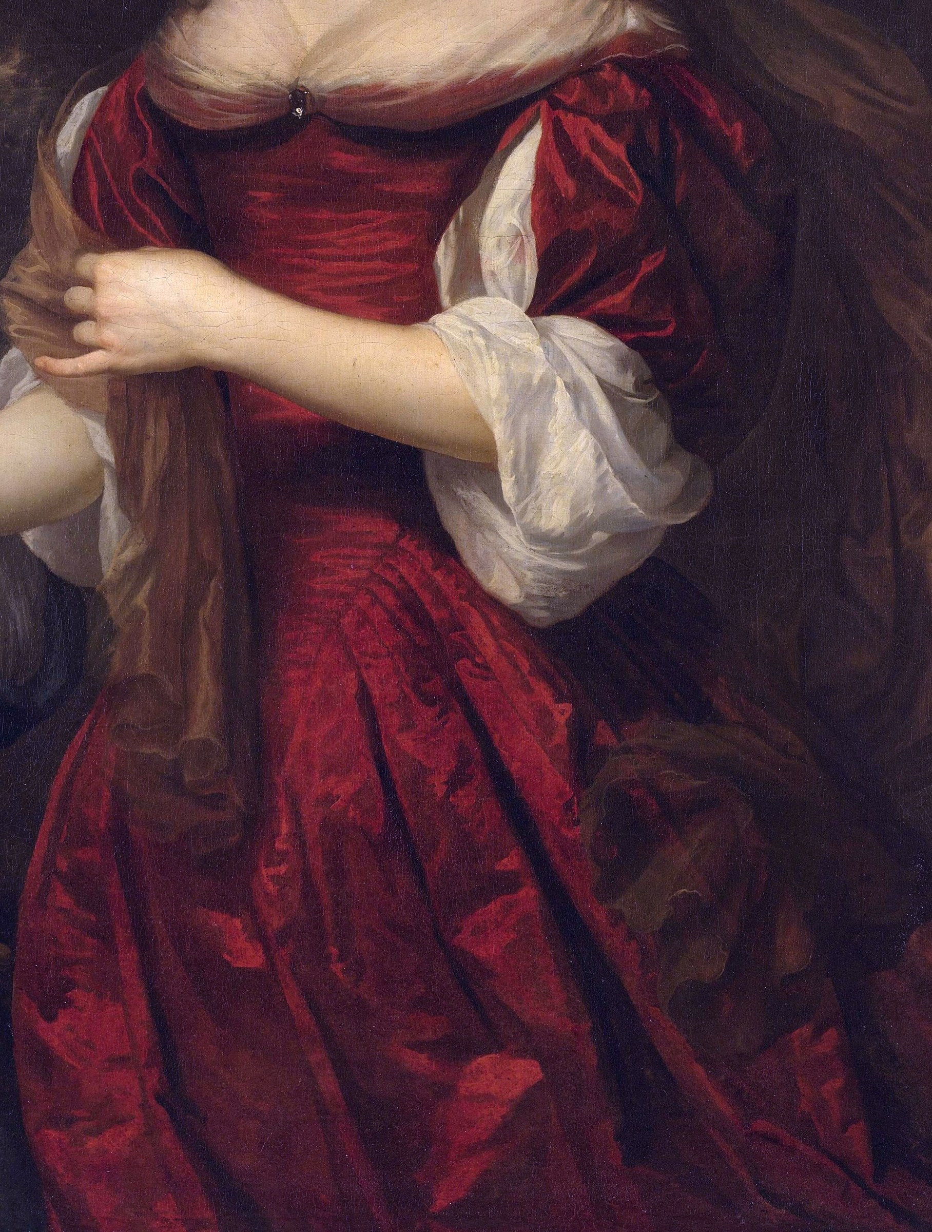 Her rich red dress shows the artist's skill.