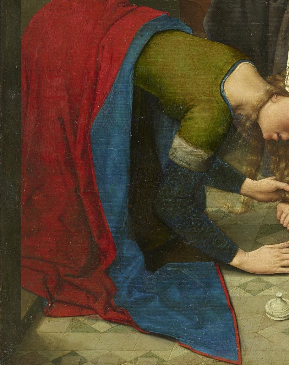 A dinner party. But one guest is on the floor.
