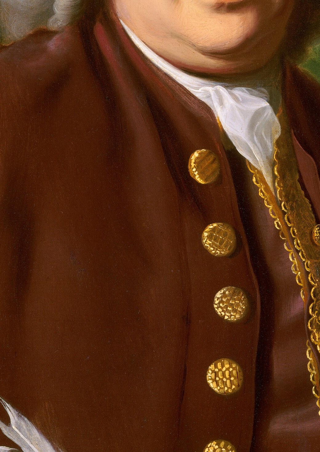 ...to the rich velvet of his coat and gold buttons.