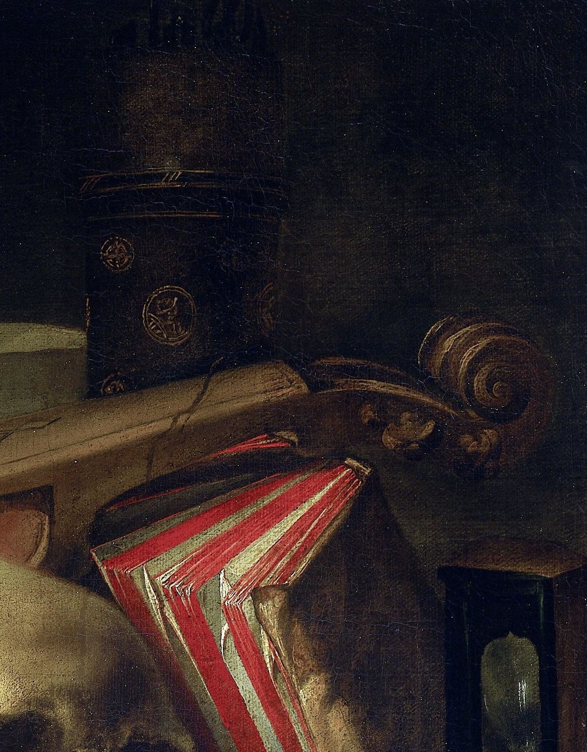 Mastery of the entire Earth compressed to a desktop ornament; its high placement above the other objects mirrors worldly ambition that ultimately collapses onto the same table