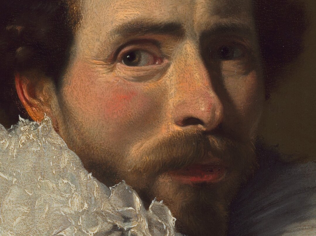 His upturned mustache and pointed beard were the fashion of a young merchant.