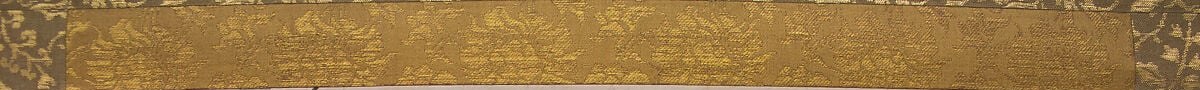 And the gold brocade border signals a formal treasured scroll.