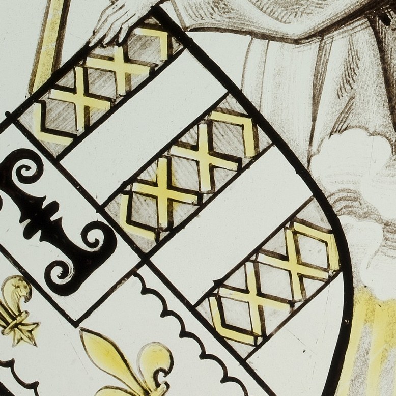 The heraldic shield is painted with precise detail.