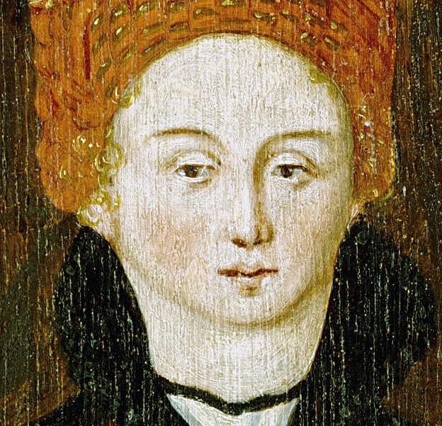 Her vibrant orange hat signals her wealth and status.