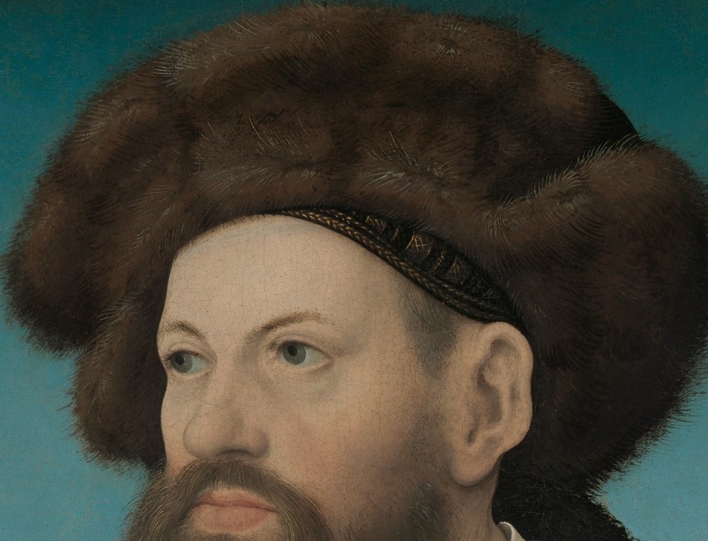 His fur hat shows his high status.