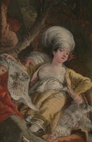Her serene expression and elaborate headdress suggest a figure of importance or contemplation.