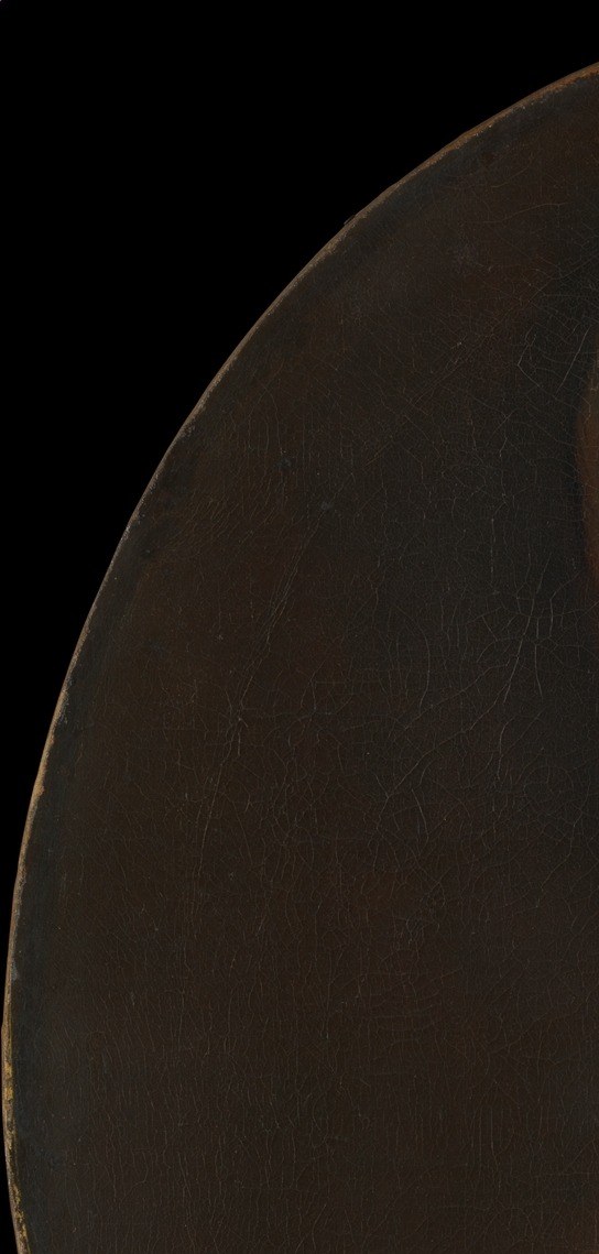 The deep umber-brown ground is a Gainsborough signature , it pushes the pale figure forward while hinting at an unspecified interior space, a technique lifted from van Dyck.