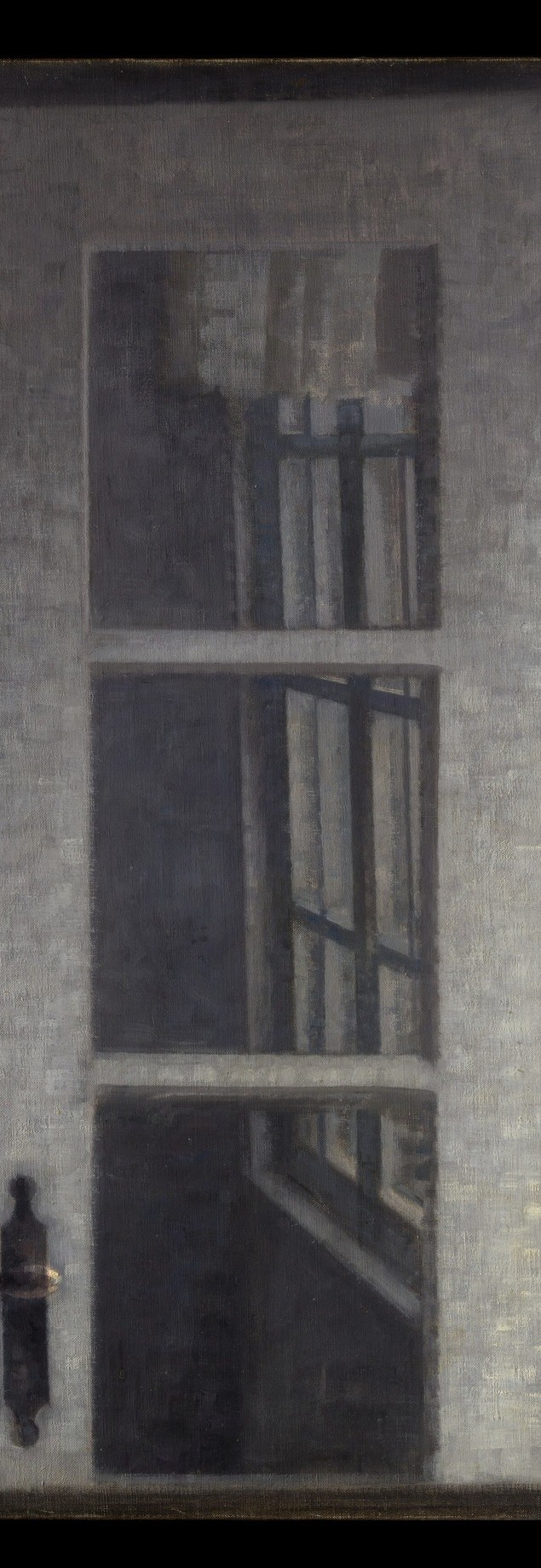 Now look closely at the window pane behind him.