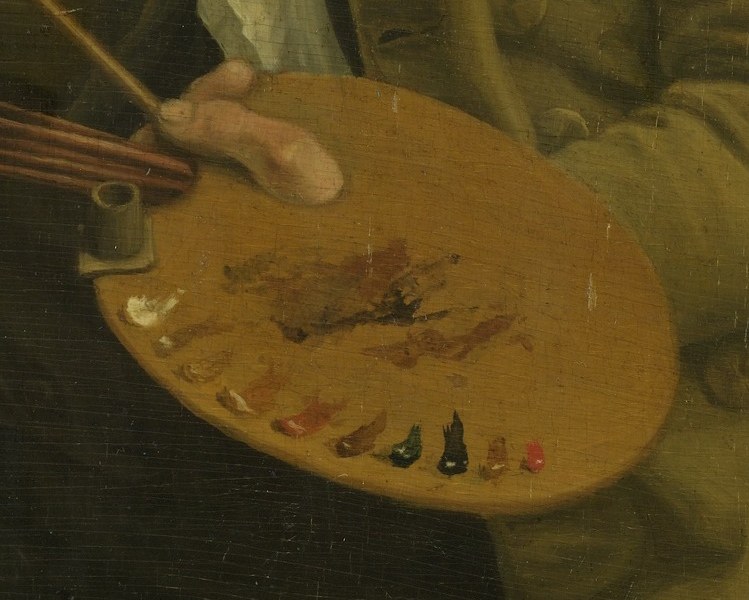 He holds a wooden palette with fresh dabs of oil paint.