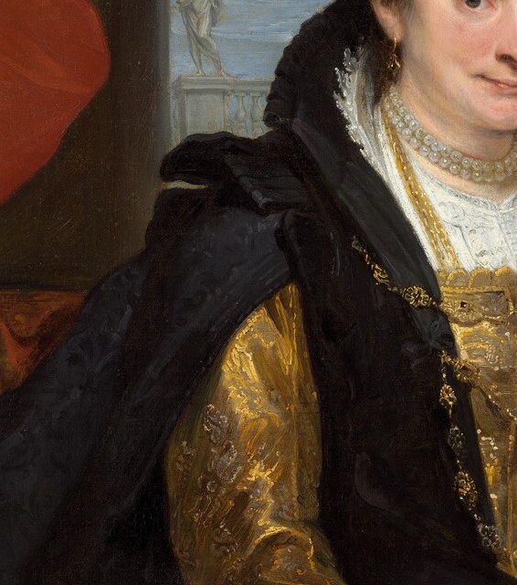 The lustrous satin sleeve glows against the dark outer robe, demonstrating Van Dyck's mastery of light on silk , a technique he would develop further in Italy.