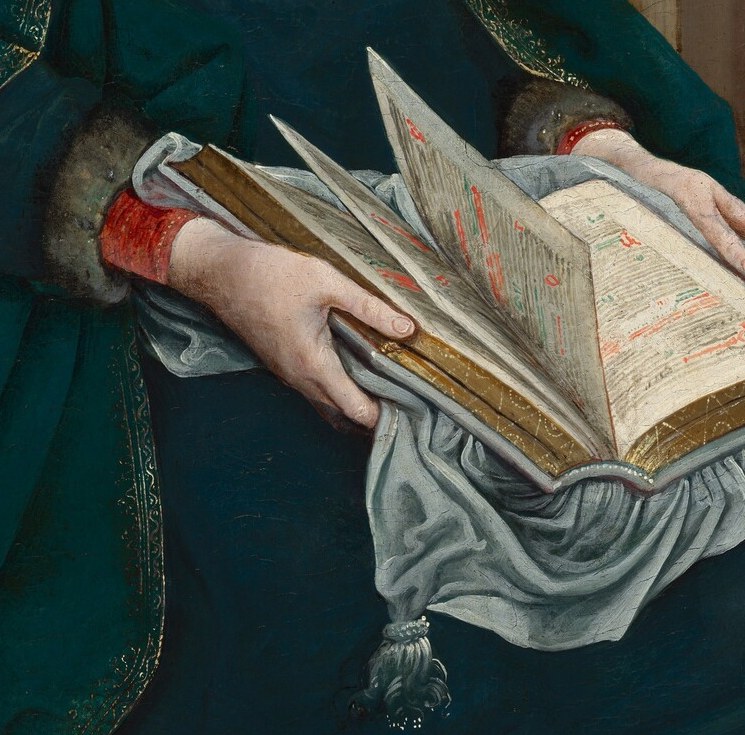 Her hands gently hold a book, open to God's word.