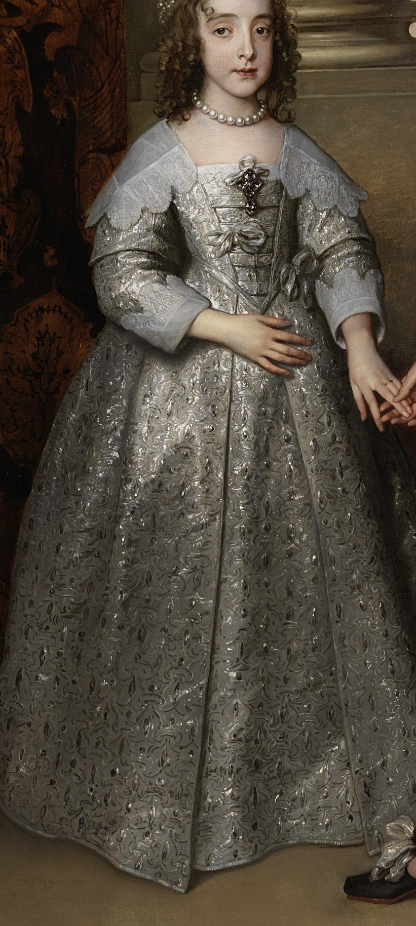 Virtuoso passage of Van Dyck's silks , the woven pattern and reflected light capture the stiffness of cloth-of-silver worn by royalty.
