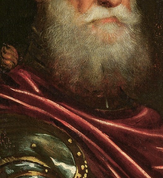 The voluminous beard adds to his gravitas and suggests age and wisdom.