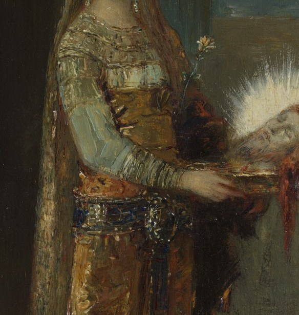 The luminous halo glowing around the severed head is the theological crux , holiness persists even in death