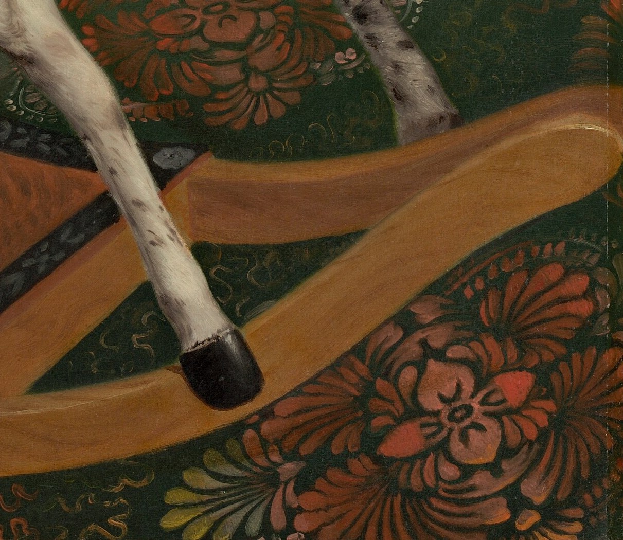 But look closely at the green rug underfoot.