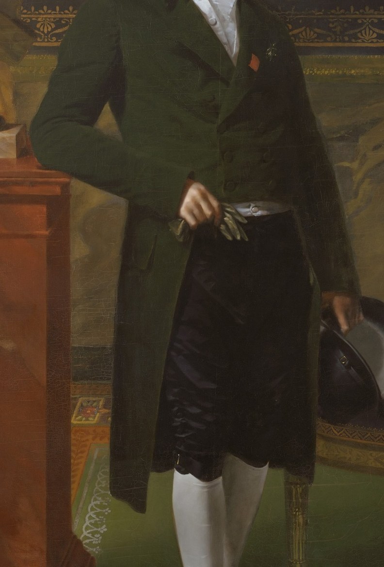 His dark green coat speaks of wealth.