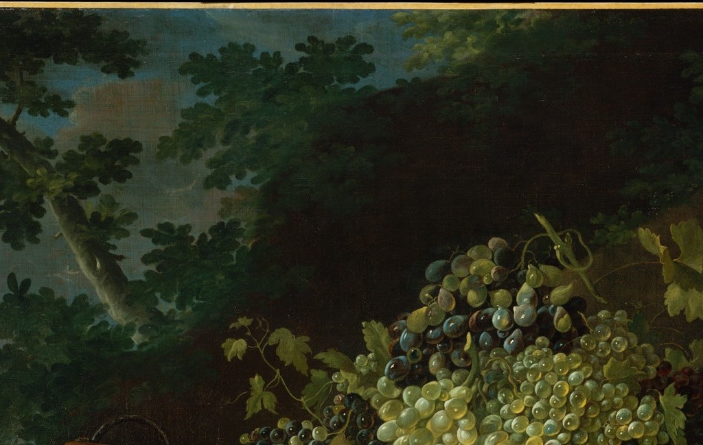 But look at the grapes. Each one catches light differently.
