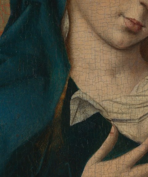 See the child reaching toward Mary's breast.
