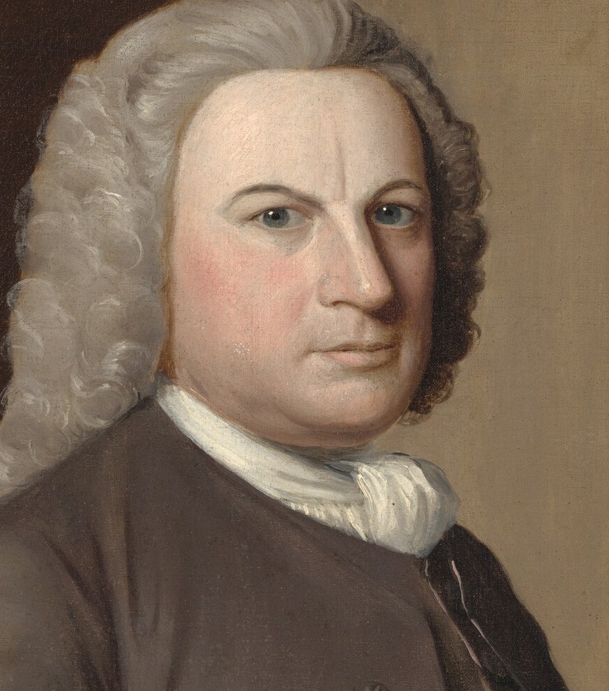 His meticulous powdered wig shows his social standing.