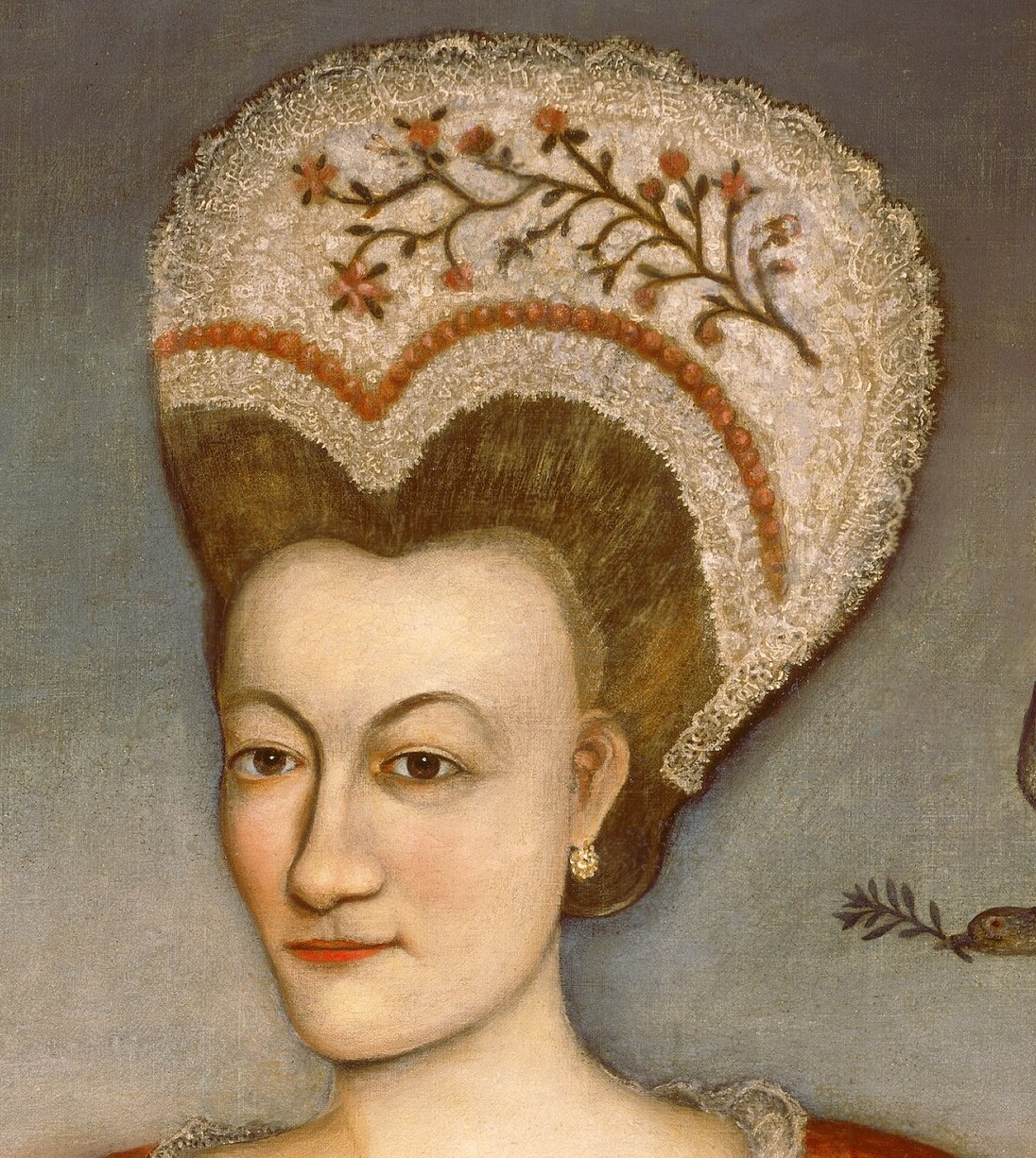 Look at the careful detail in her lace headdress.