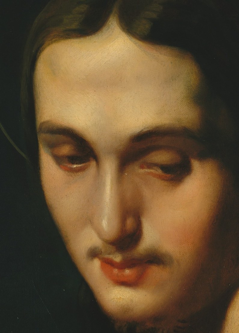 His downcast eyes and slightly parted lips convey deep introspection and spiritual contemplation.