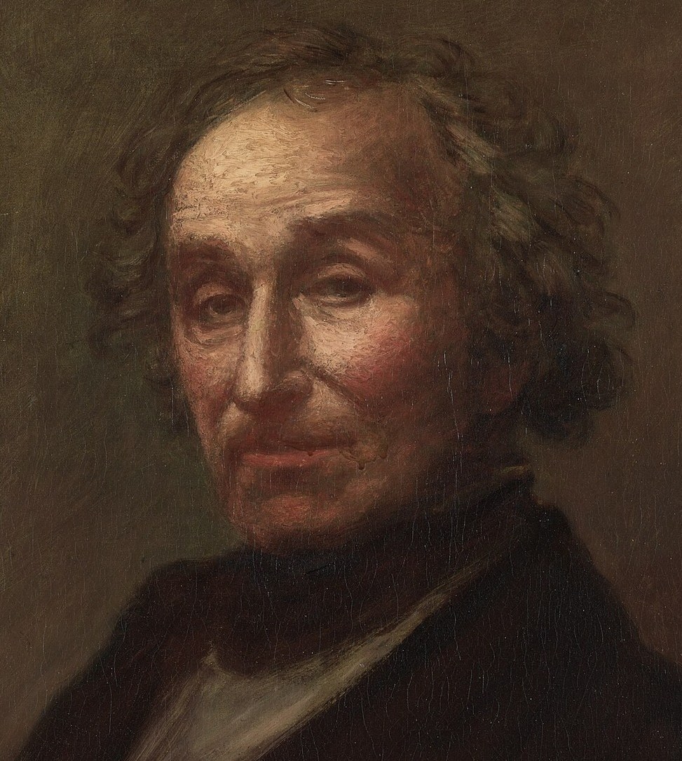 The light sculpts his face, a master of celestial observation.