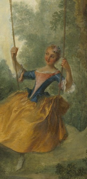 Look at the woman mid-air on the swing.