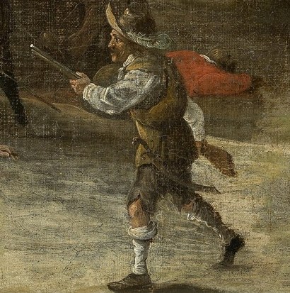 A man with a sword stands ready for defense.