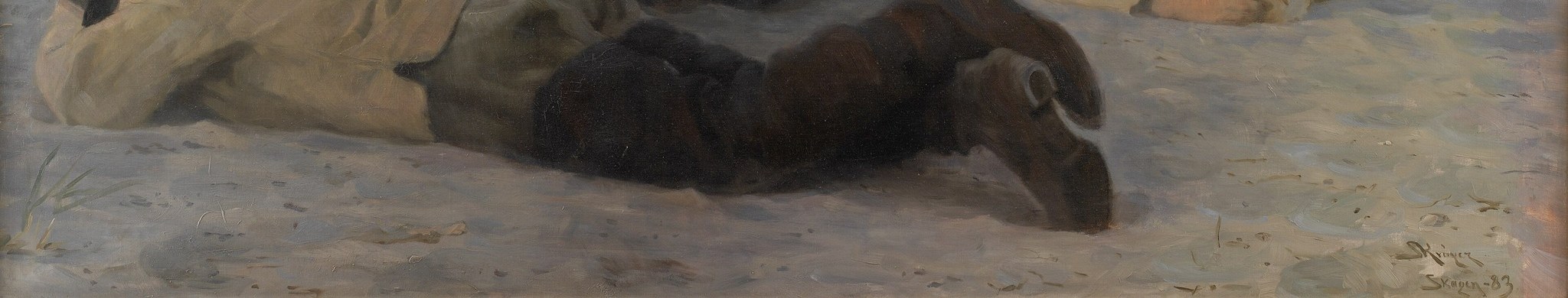 Here, four men rest on the sandy beach after a day's labor.