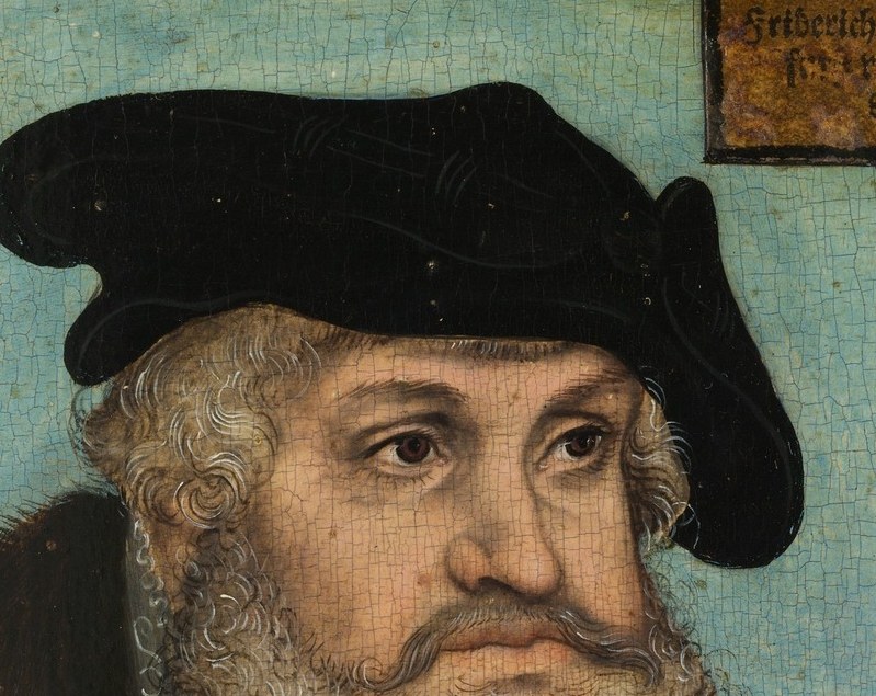 The distinctive shape and dark color of the hat add to his imposing presence and status.