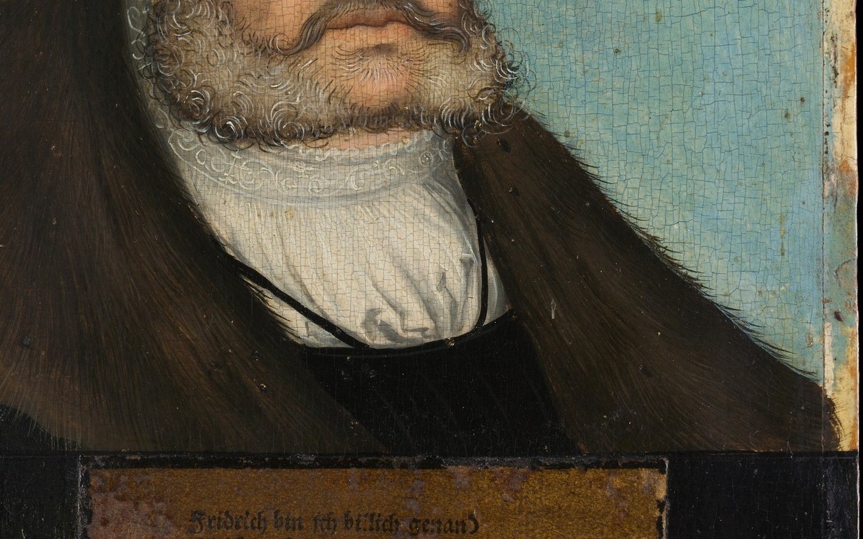 The rich fur and dark fabric suggest wealth and high social standing.