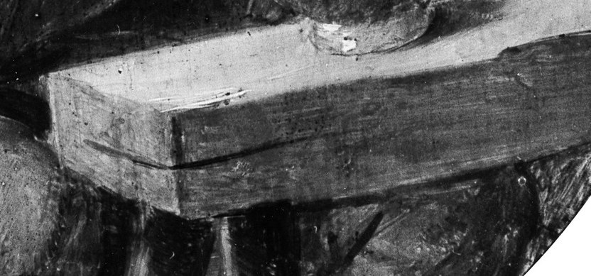 The texture of the wood grain is visible, grounding the scene in a tangible, humble reality.
