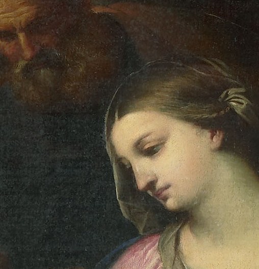 Her gentle gaze and slightly downcast eyes convey maternal tenderness and perhaps a hint of future sorrow.