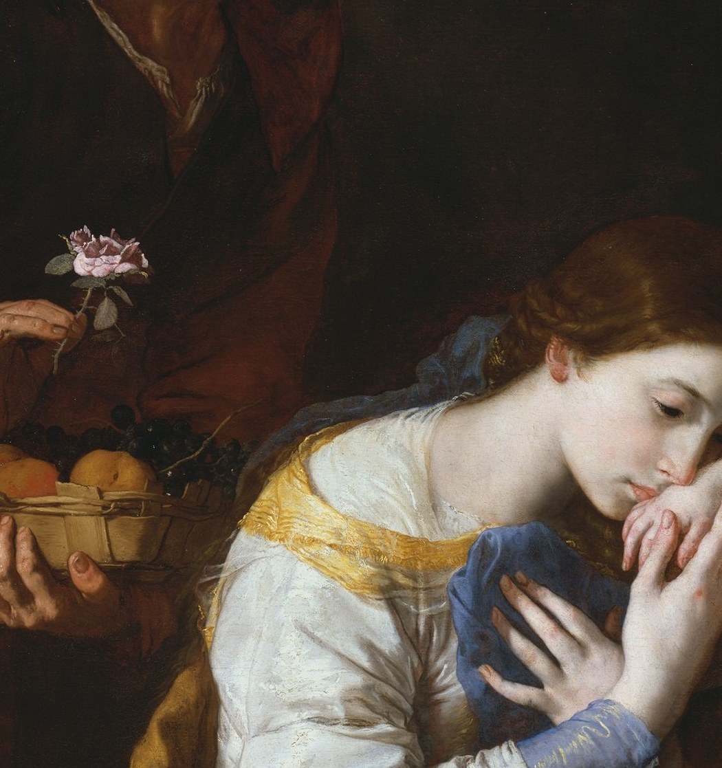 Youthful, idealized face in absorbed devotional attention , her beauty marks her as Catherine the philosopher-martyr; the contrast with the aged Anne is deliberate.
