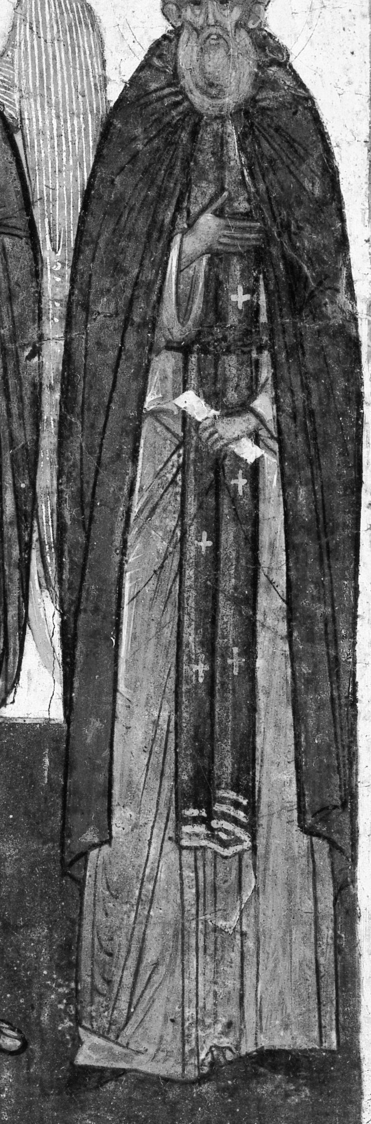 This figure's staff and book identify him as a prophet.