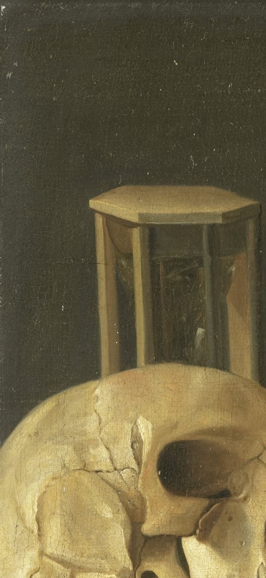 An hourglass with the sand still falling.