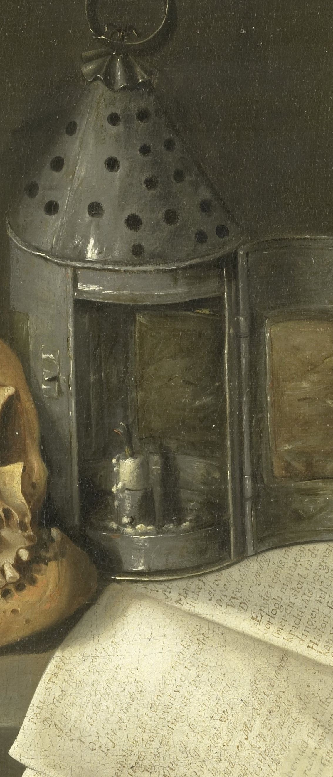 A metal lantern with its flame gone out.