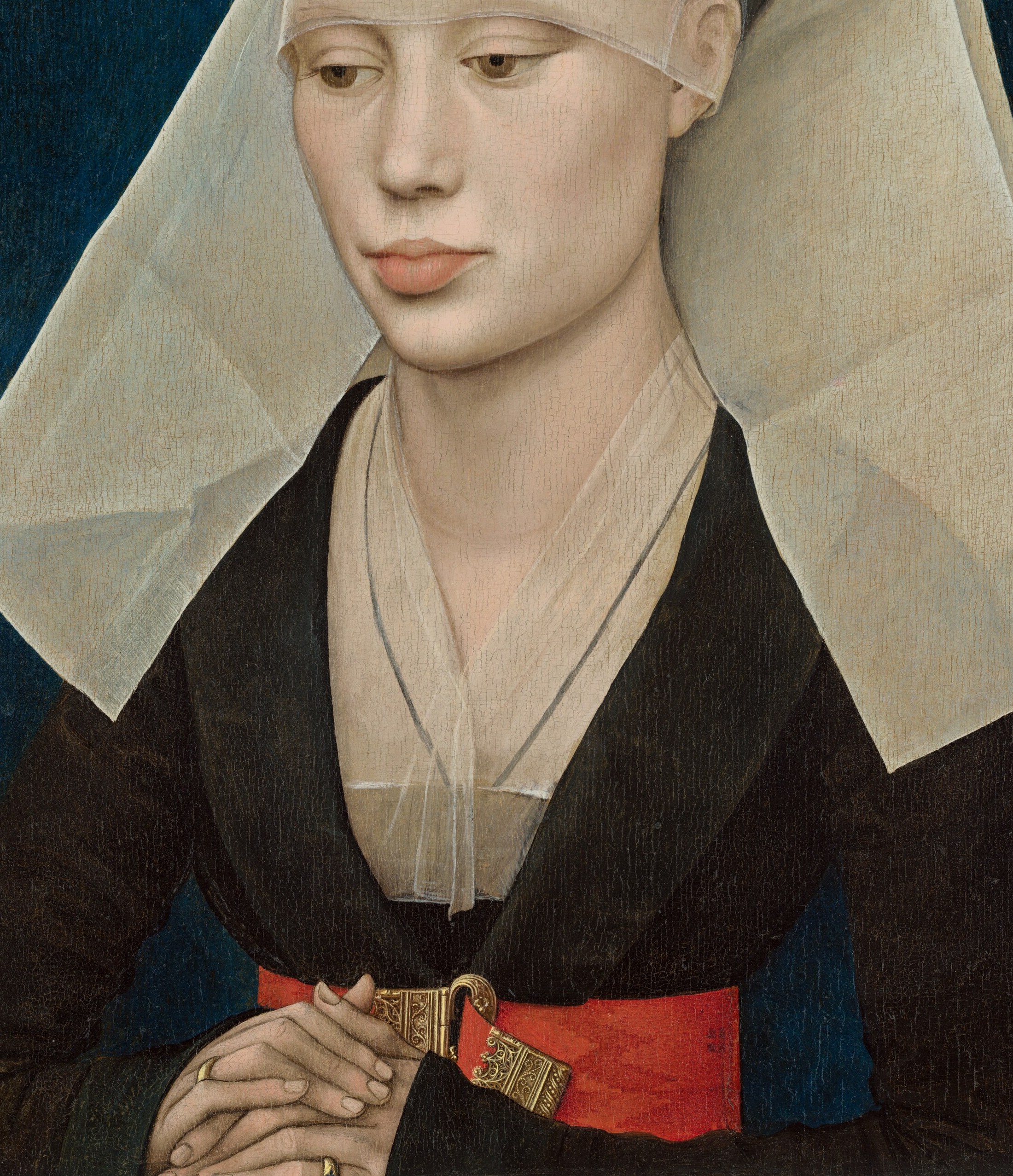 The shimmering gold-ivory fabric dominates the lower canvas; the paint handling of reflected light across the folds is the painting's principal technical showpiece.