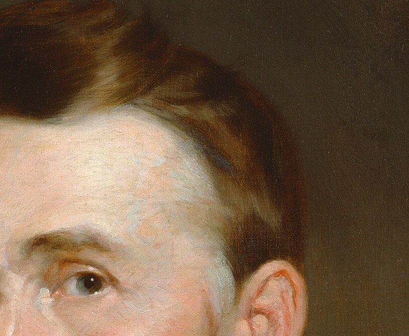 Look at the left eye, falling into shadow. An asymmetry that makes him alive.